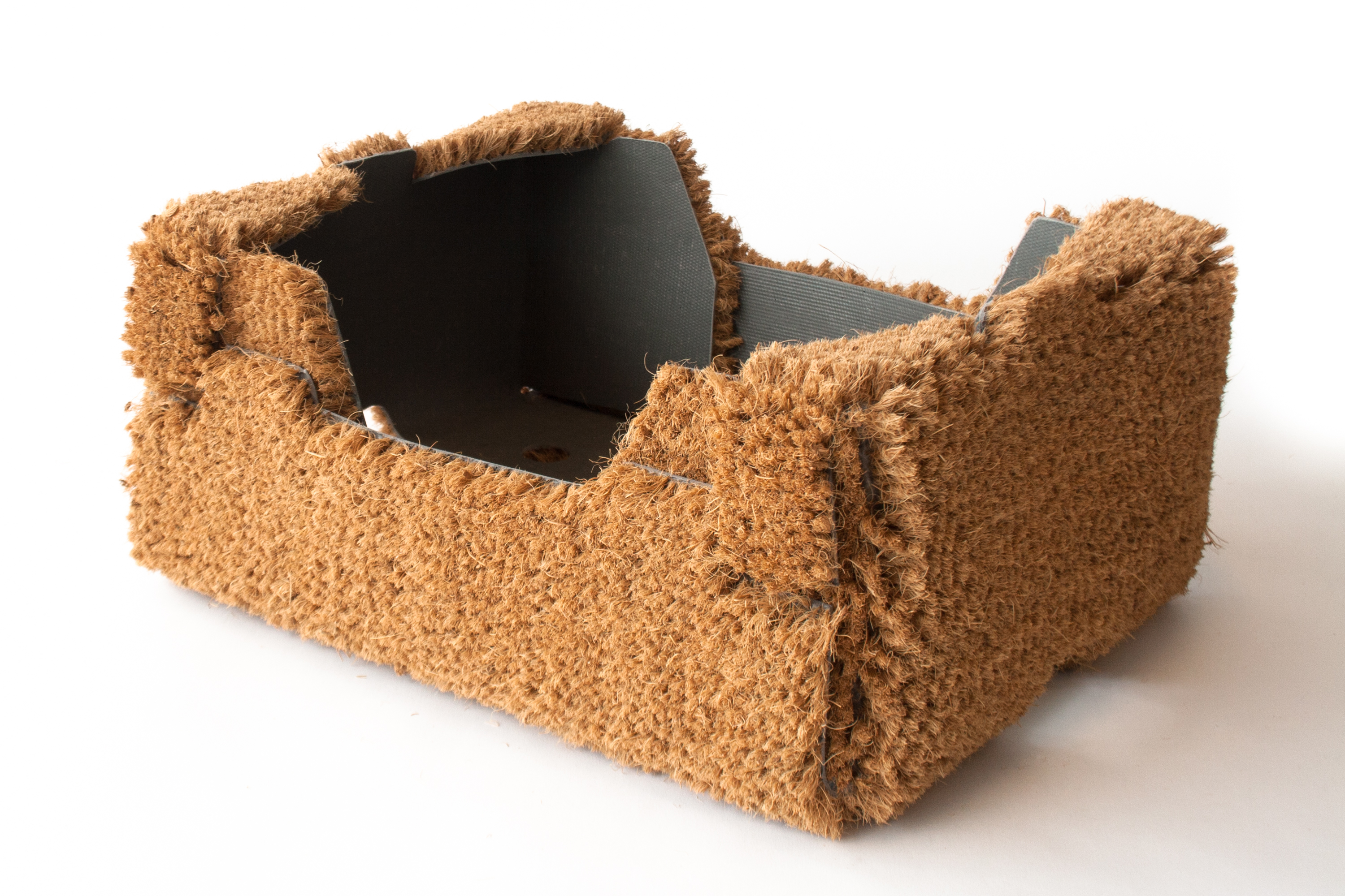 Doosmat, a cardboard box made from a doormat, designed by Jarle Veldman