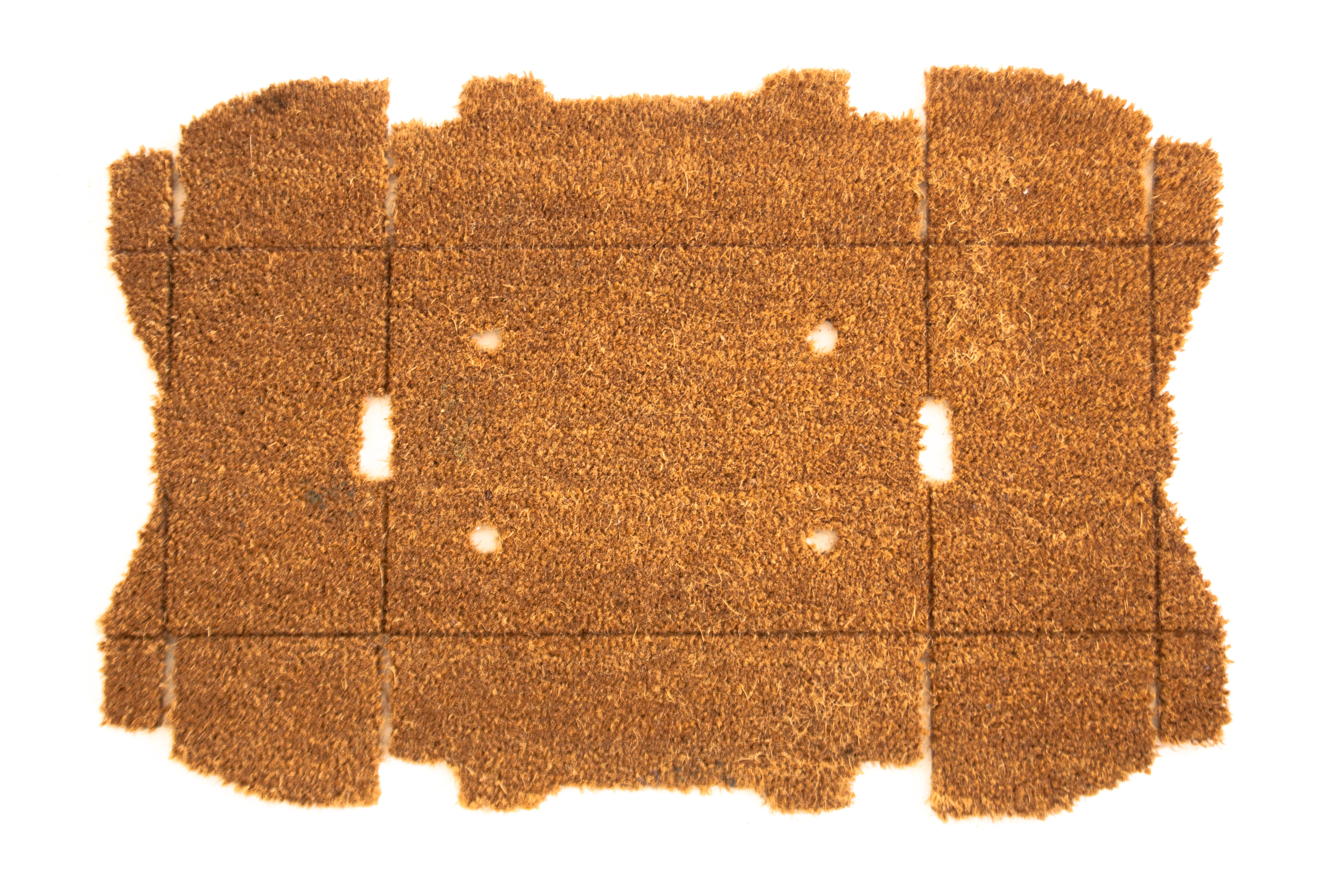 Doosmat flat, a doormat in the shape of a flattened cardboard box, designed by Jarle Veldman